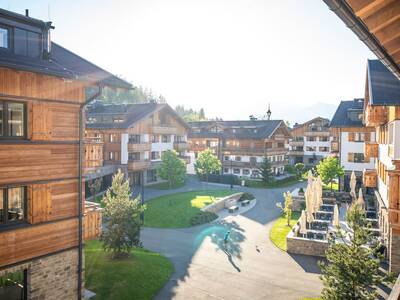 Zomerfoto van appartementengebouwen op Landal Alpen Resort Maria Alm