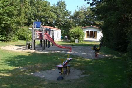 Speeltuin voor chalets op vakantiepark Roompot Kustpark Texel